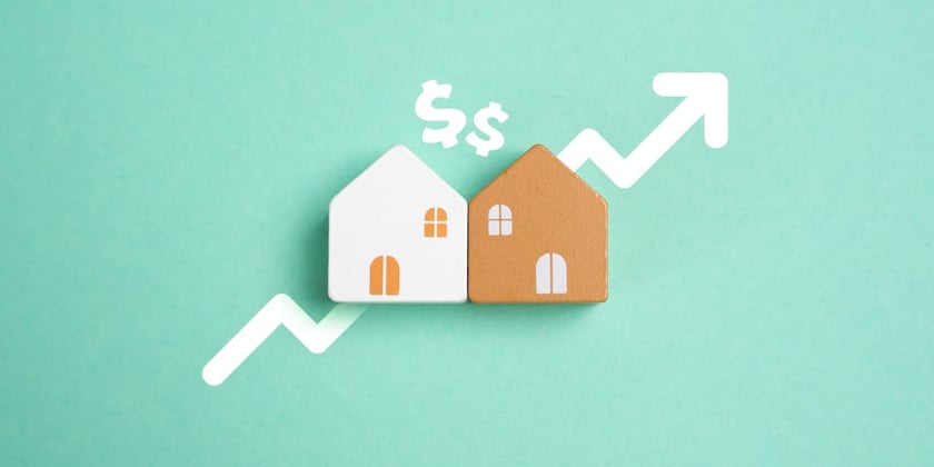Dollar signs and an up arrow around small houses