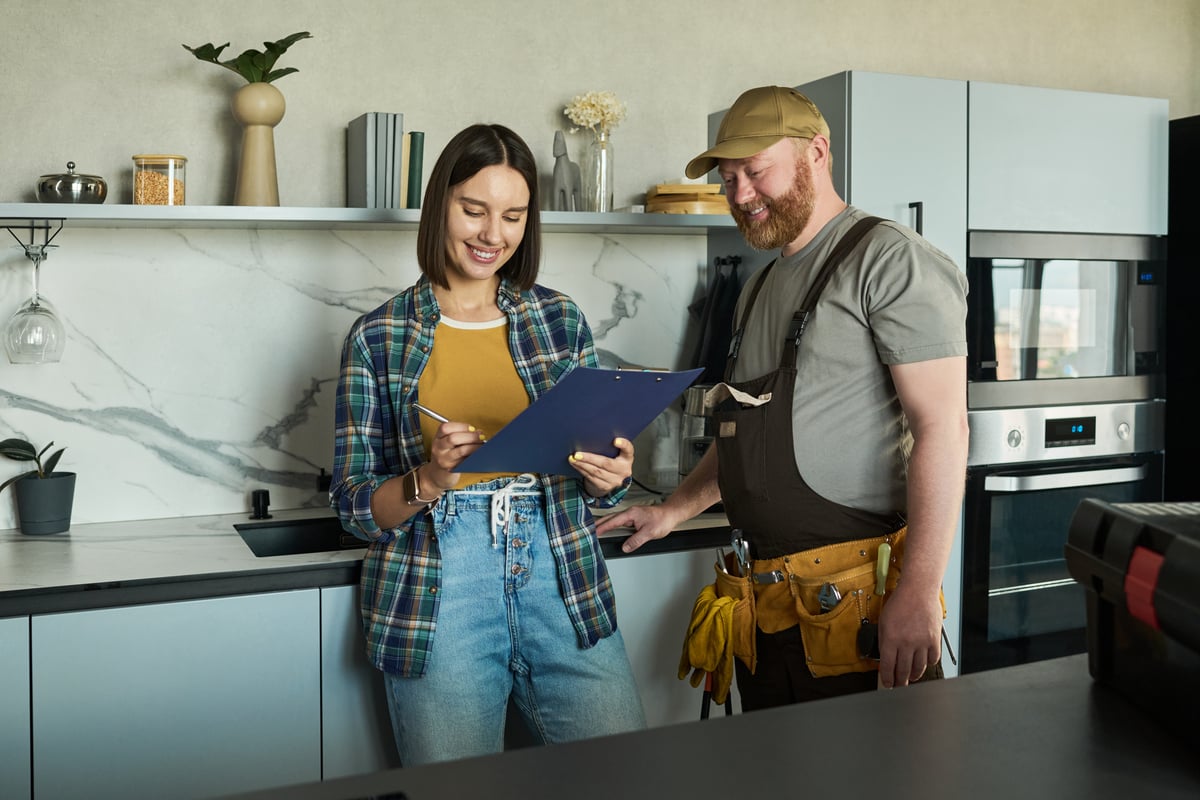 Home Repair Consultation in Modern Kitchen