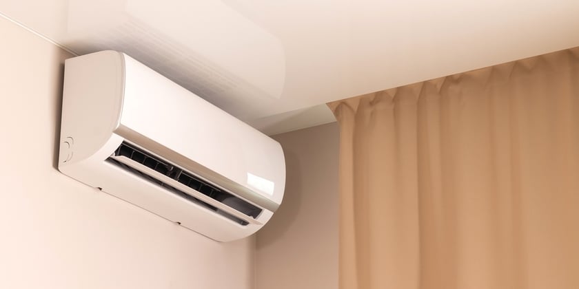 White air conditioner in modern room