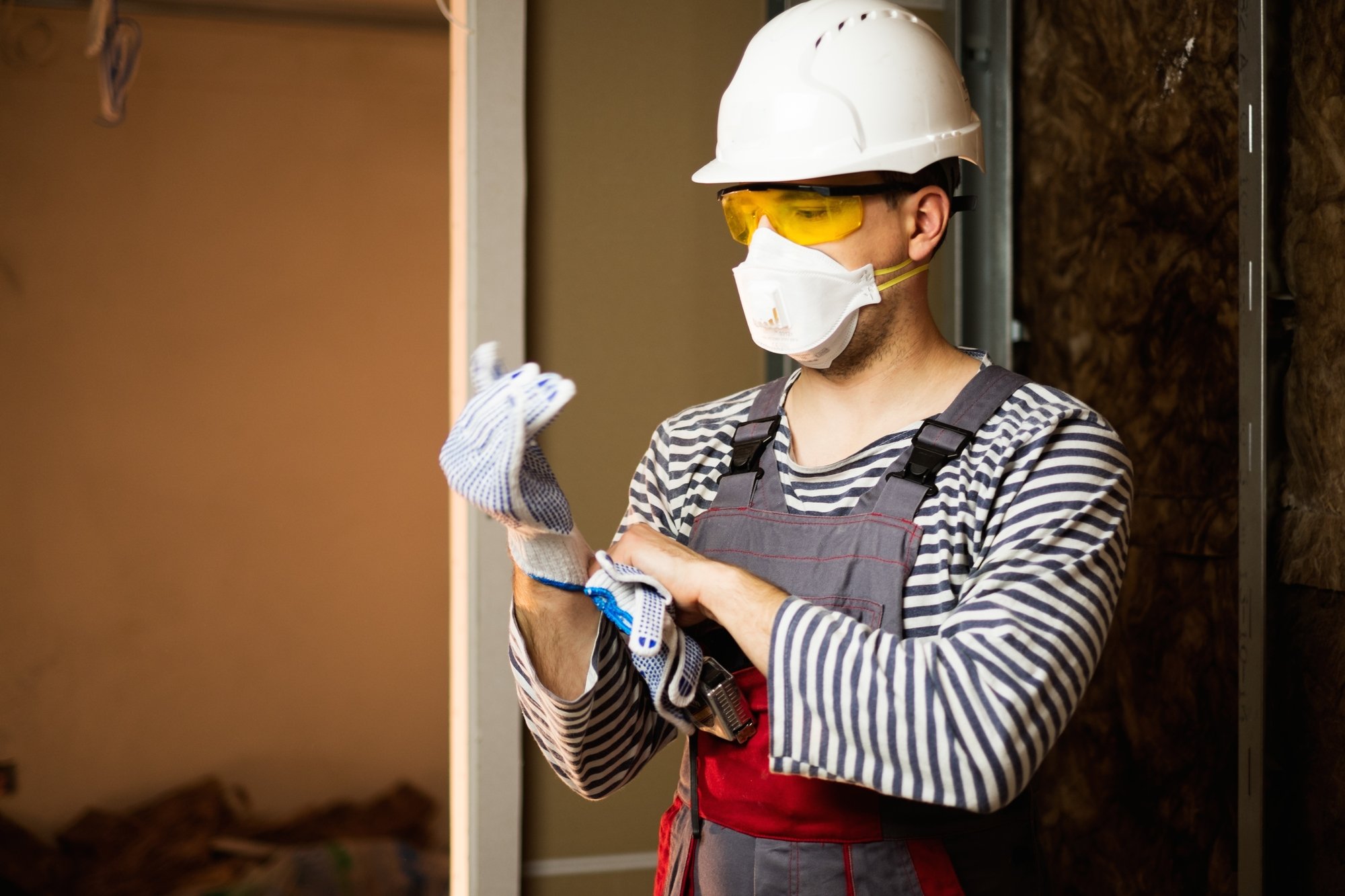 Builder in protective wear