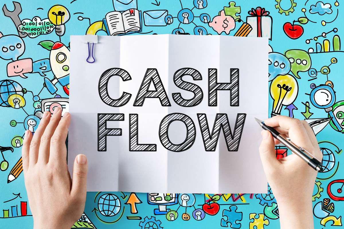 Cash Flow text with hands (R) (S)
