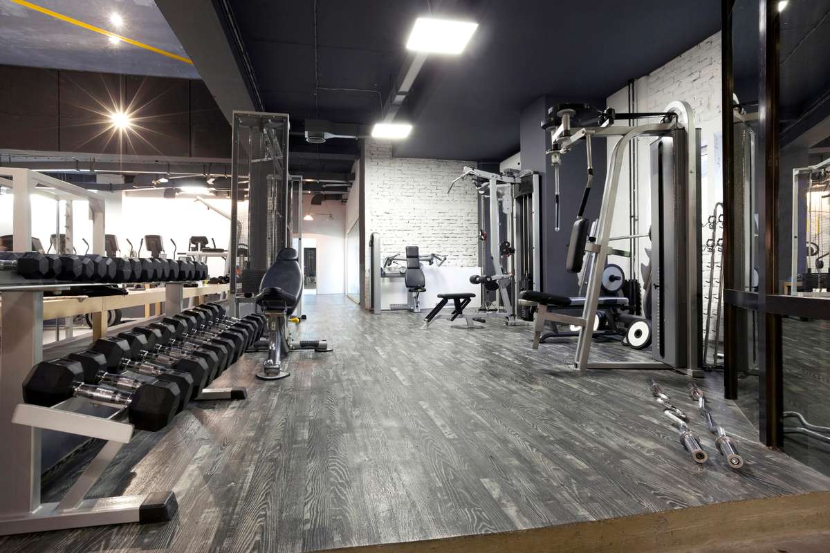 Modern gym interior with various equipment (R) (S)