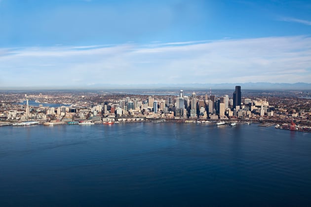 This image features the Seattle skyline, representing property management in Everett, Washington