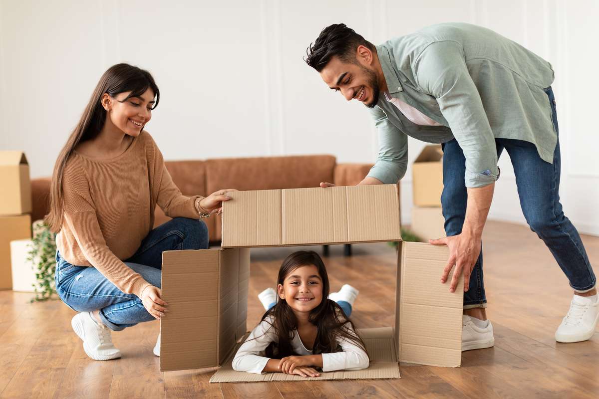 happy loving young family celebrating relocation