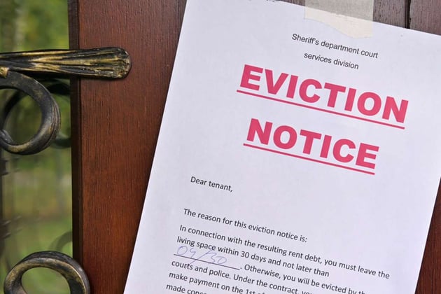 An eviction notice on a door. 