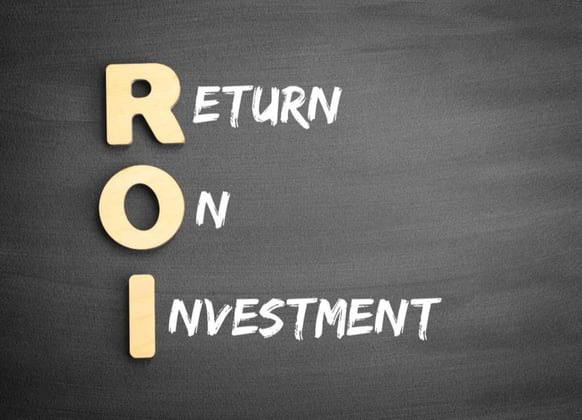 ROI spelled on a board
