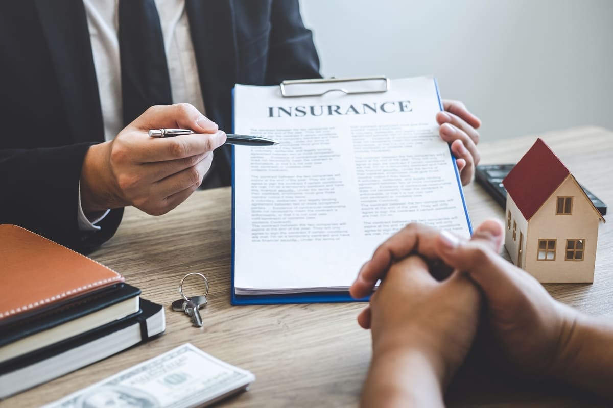 A lawyer showing an insurance document