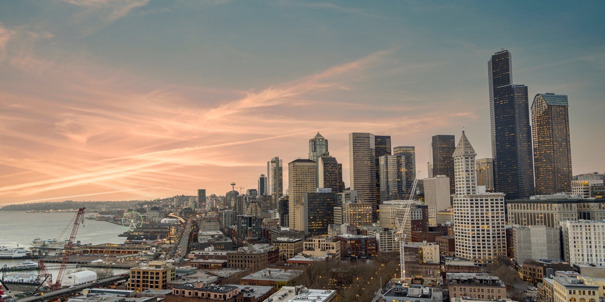 Downtown Seattle Washington skyline with waterfront at sunset