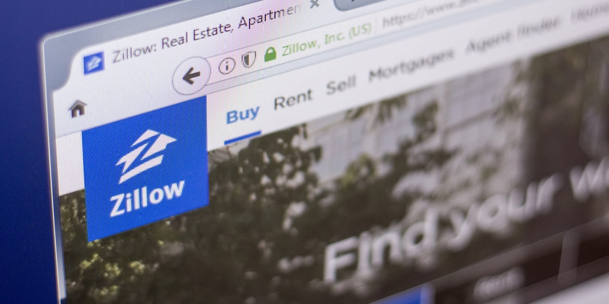 Homepage of Zillow on a laptop screen