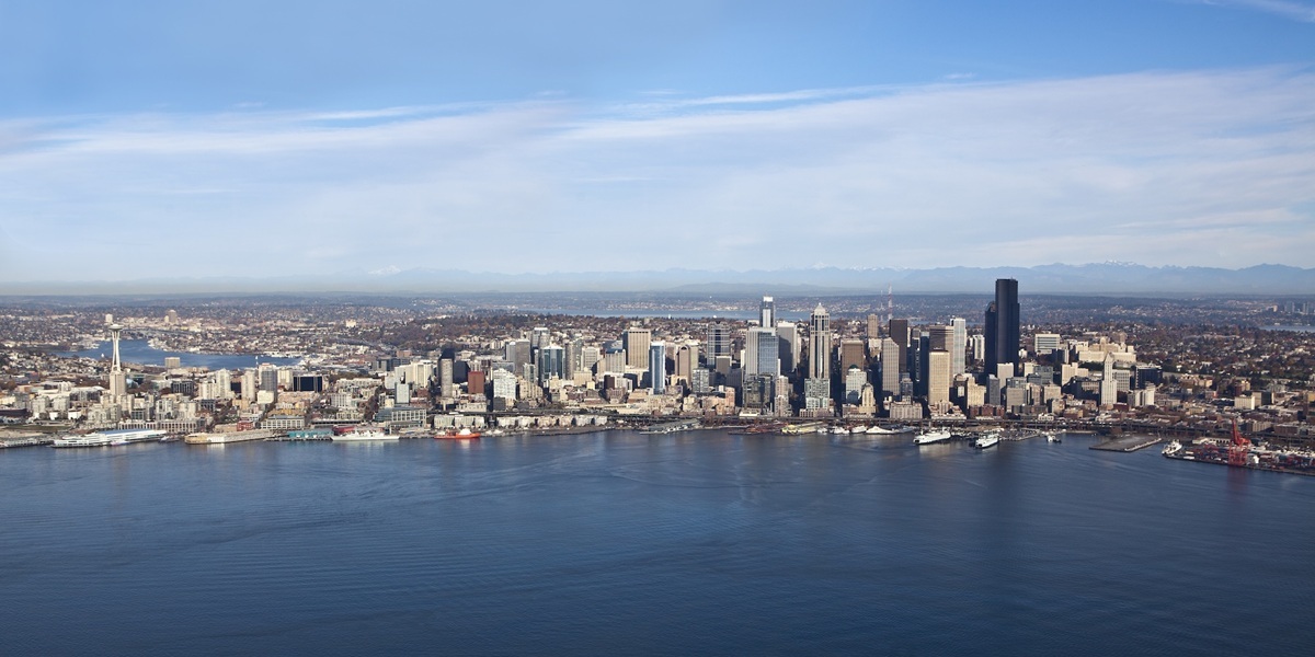 This image features the Seattle skyline, representing property management in Everett, Washington