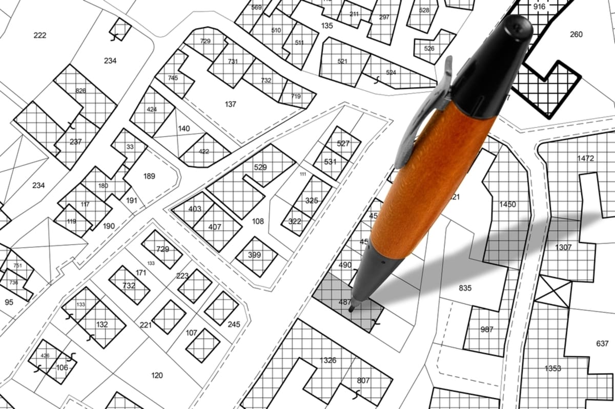 Zoning, property registration, and real estate ownership concept.