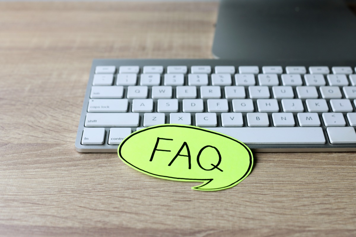 FAQ Concept with Keyboard and Speech Bubble