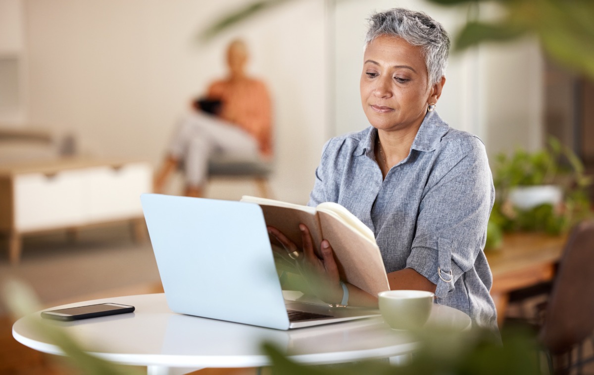 Woman Reads Book in Modern Home Interior