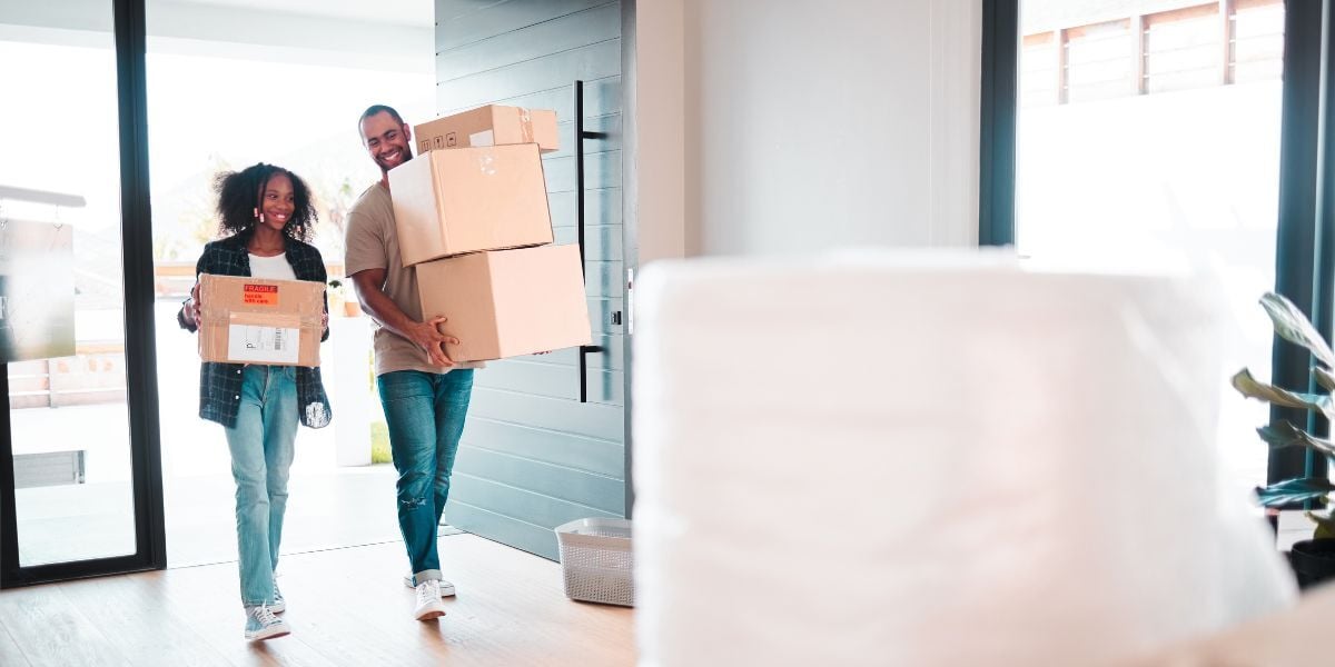 Girl and her father moving into their new home