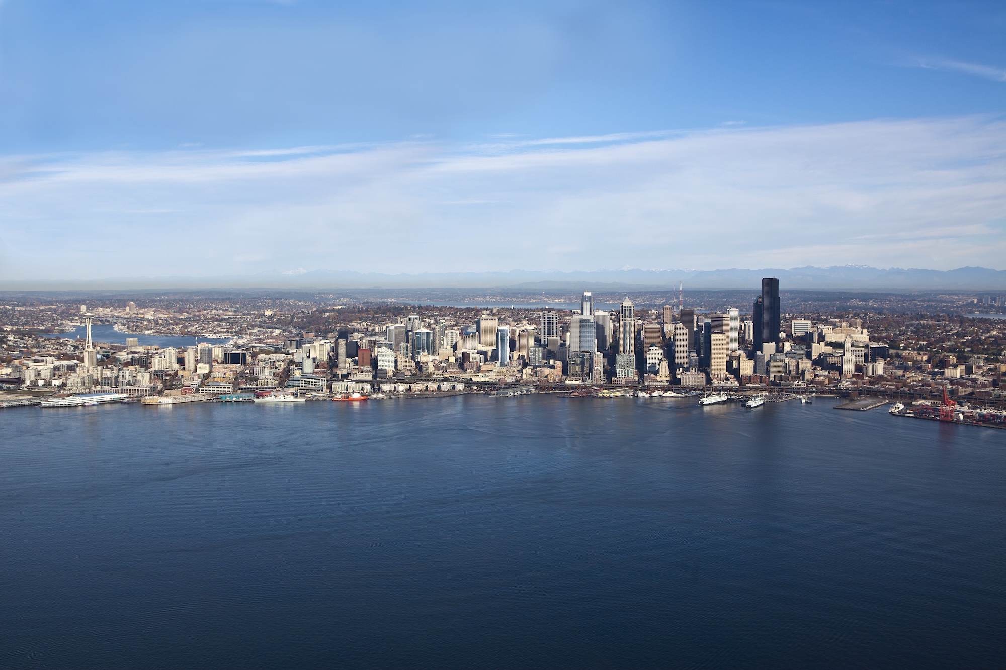 This image features the Seattle skyline, representing property management in Everett, Washington