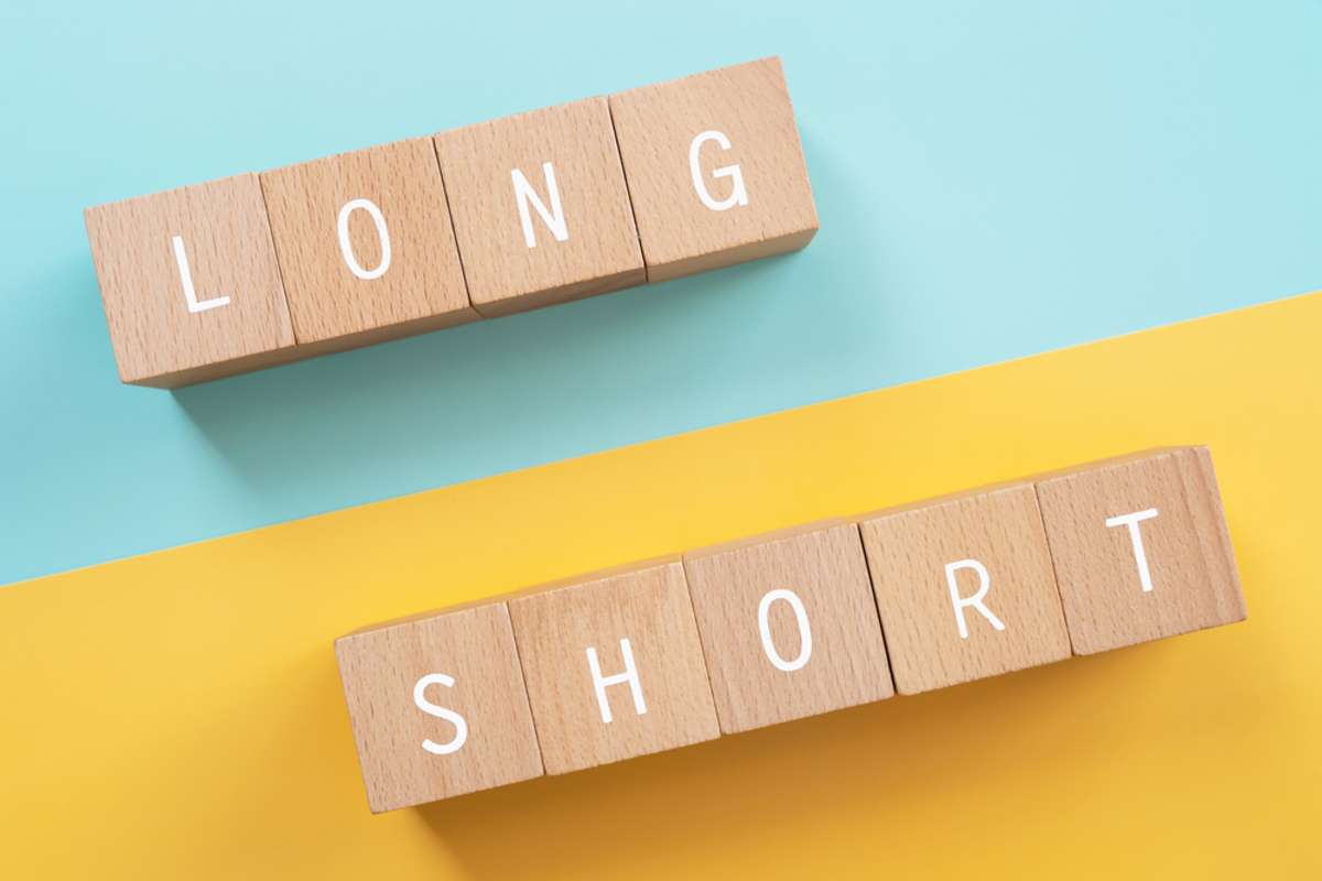 The words long and short spelled on wooden tiles
