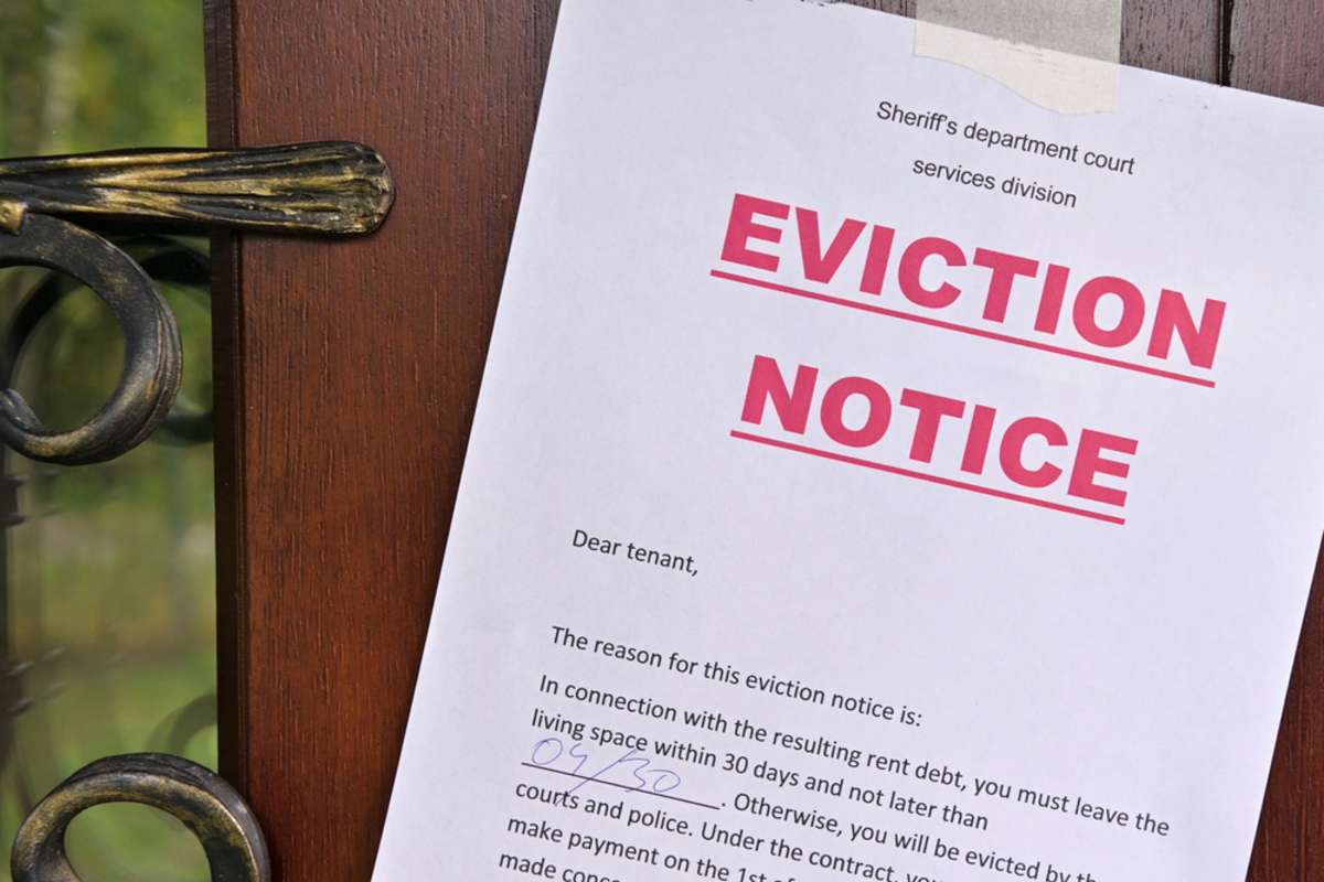 An eviction notice on a door. 